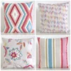 A collection of four coordinating cushion covers in pink flambe colour way.