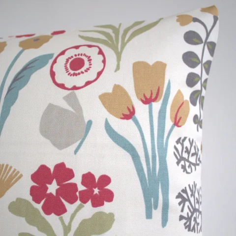 Scandi cushion cover with a floral pattern in pastel colours