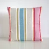 Multi coloured striped cushion cover featuring a multi width stripe pattern