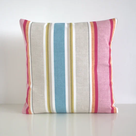 Multi coloured striped cushion cover featuring a multi width stripe pattern